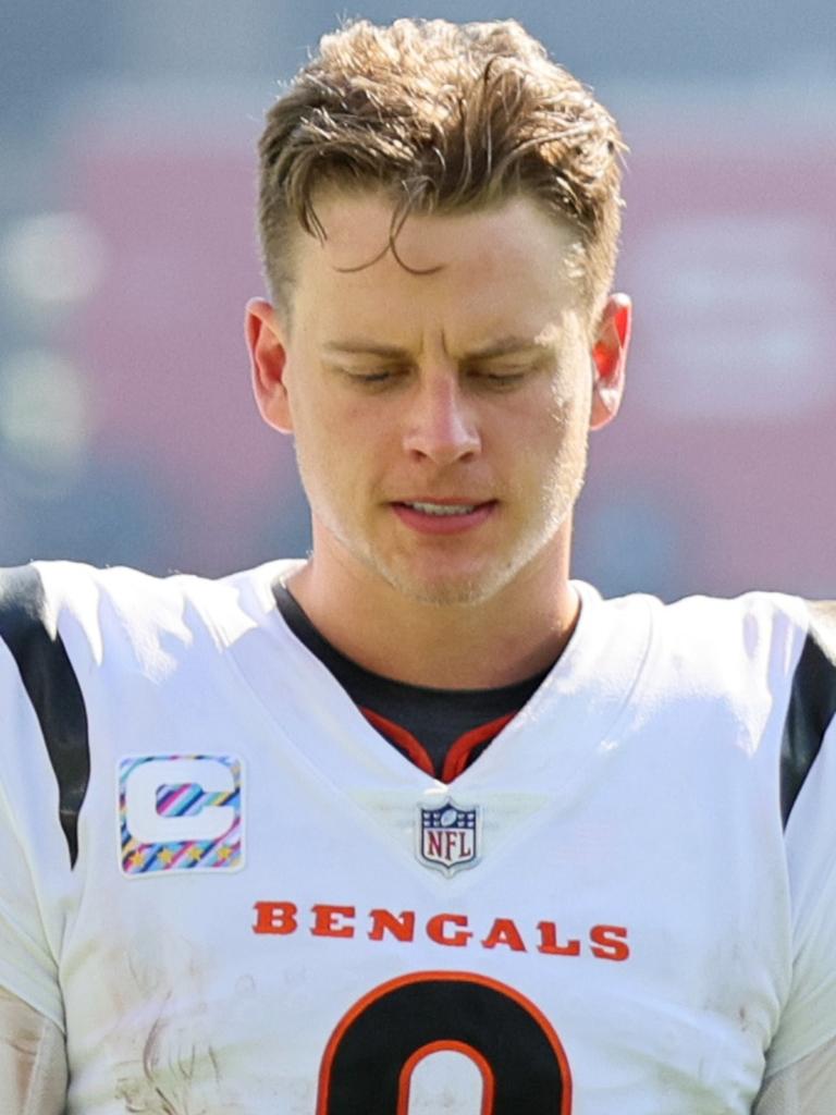 FOXBOROUGH, MA - DECEMBER 24: Cincinnati Bengals quarterback Joe Burrow (9)  smiles on the field following a game between the New England Patriots and  the Cincinnati Bengals on December 24, 2022, at