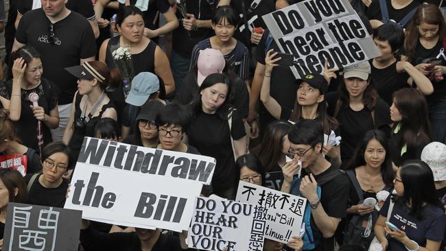 Protesters march in Hong Kong. Picture: AP