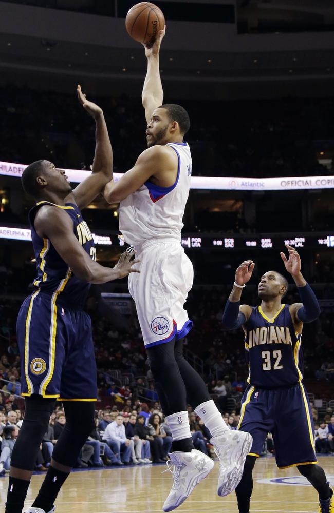 Philadelphia 76ers JaVale McGee, centre, goes up for a shot.