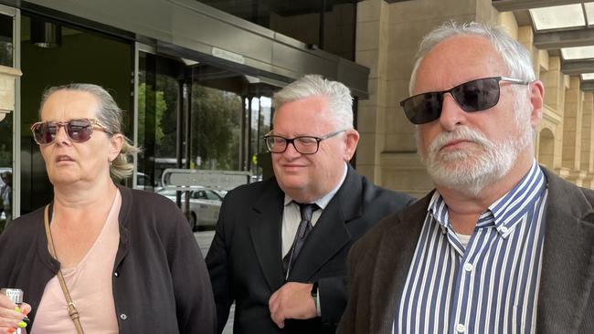 Terry Christopher Donovan (middle) with supporters outside court. Picture: Supplied