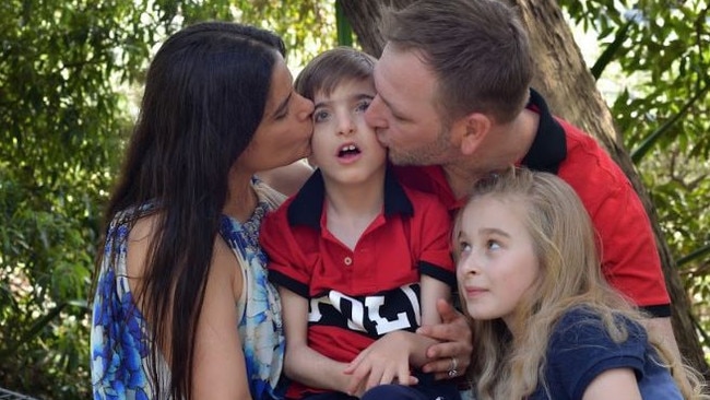 The Adamski family. Left to right, mum Marta, Christian, 8, dad Luke, and Naomi, 9. Picture: Supplied.