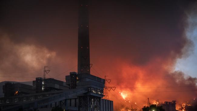 The fire reaches the perimeter of the Kemerkoy Thermal Power Plant on Thursday. Picture: Getty Images