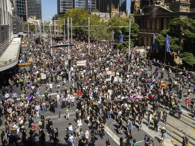 SYDNEY, AUSTRALIA - MARCH 15: A general view of crowds at Town Hall on March 15, 2021 in Sydney, Australia. Thousands are expected at Ã¢â¬ÅMarch 4 JusticeÃ¢â¬Â rallies across Australia calling for  action against gendered violence in Parliament as news of the alleged rape of former Brittany Higgins at Parliament House and allegations that Attorney-General Christian Porter raped a 16-year-old gear when he was 17 in 1988 continue to cause outrage. (Photo by Jenny Evans/Getty Images) ***BESTPIX***