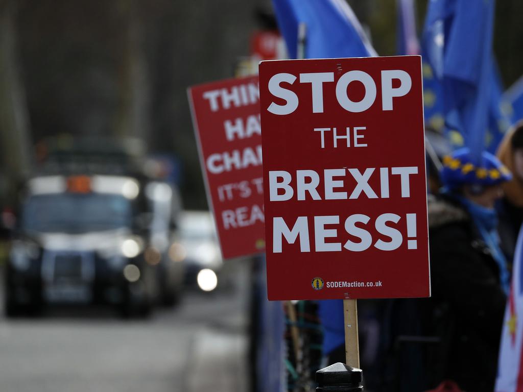 Pro-European demonstrators protest outside parliament in London on Friday. Britain is due to leave the EU on March 29. Picture: AP