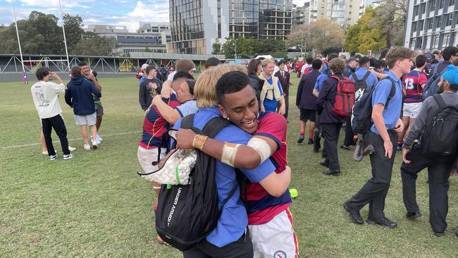 Brisbane State High School sudents and players celebrate the win.