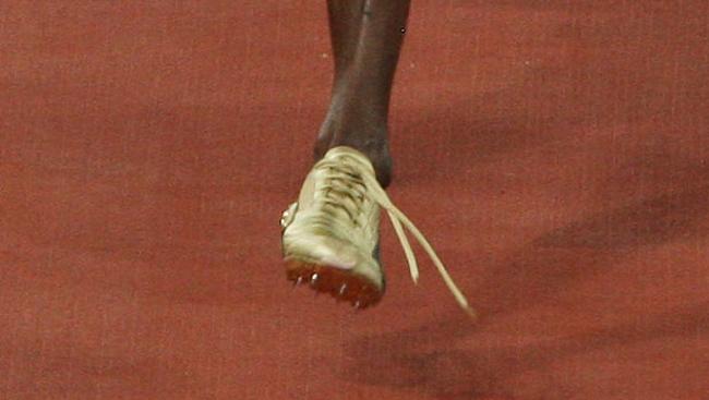 Beijing Olympics 2008. Athletics Men's 100m Final.. Jamaica's Usain Bolt wins in world record time of 9.69 with shoe lace untied.