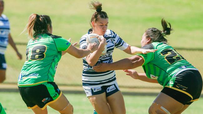 Palmerston defence stops Sistaz Jade Jones-Cubillo. Picture: GLENN CAMPBELL