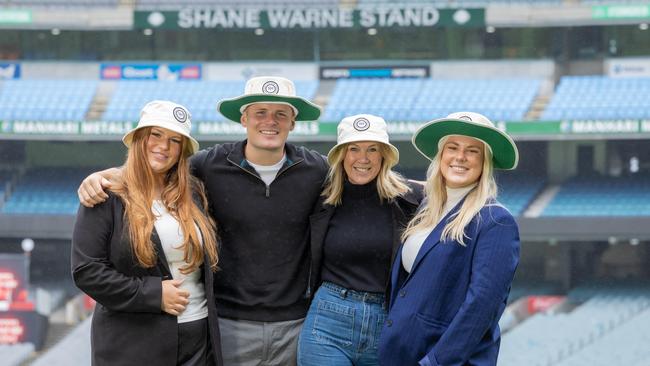 Summer, Jackson and Brooke Warne with the organisation’s chief executive Helen Nolan. Picture: Jason Edwards