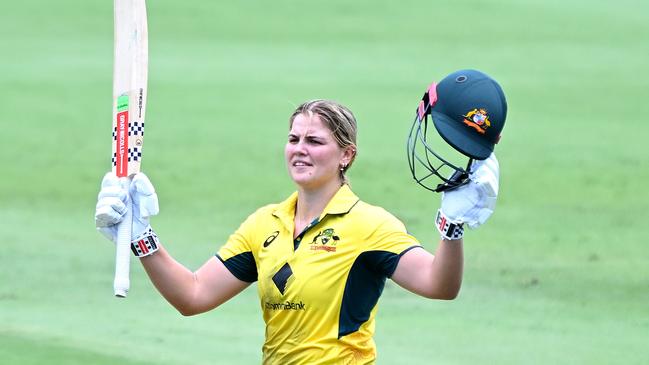 Georgia Voll of Australia celebrates after scoring a century during game two of the Women's One Day International Series between Australia and India at Allan Border Field. Photo: Bradley Kanaris/Getty Images