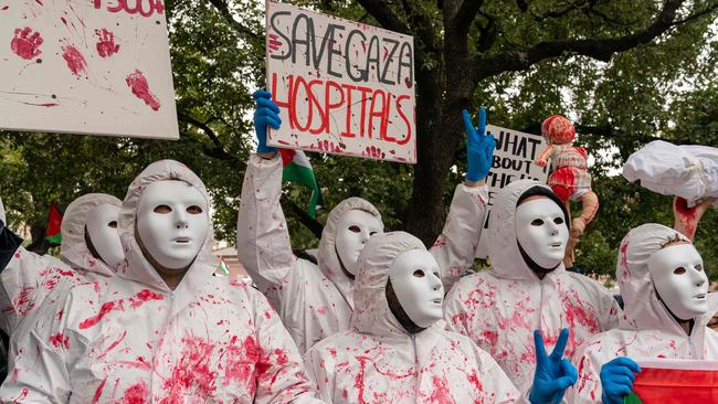 Protesters wear white masks during a rally in support of Palestinians at the Texas State Capitol in Austin, Texas, on November 12, 2023. Picture: AFP