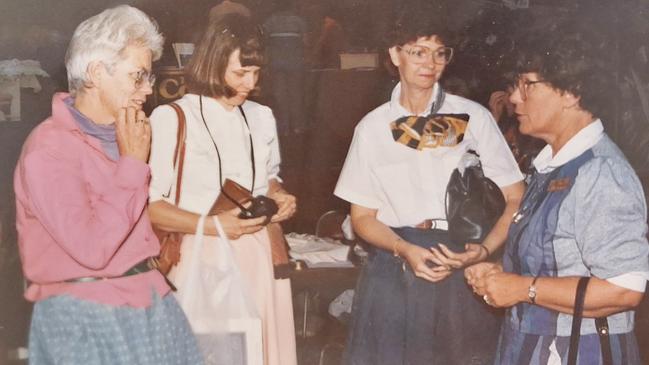 Original Toowoomba Quilters Club members Margie Creek and Trish Ostwald at the New England Patchwork and Quilters Quilt Show in 1984 with visiting tutors (names unknown). Picture: Toowoomba Quilters Club