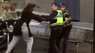 Hassan Khalif Shire Ali confronts police on Bourke St.