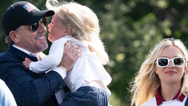 Hunter Biden holds son Beau alongside his wife, Melissa Cohen, on July 4. Picture: AFP