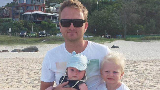 Mr Croll with his kids before the tragic surfing accident.