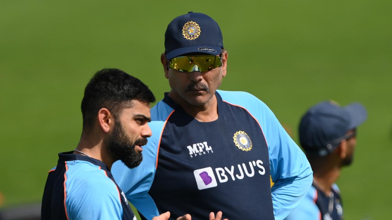 LEEDS, ENGLAND - AUGUST 23: India captain Virat Kohli chats with Head Coach Ravi Shastri during India nets ahead of the Third Test Match against England at Emerald Headingley Stadium on August 23, 2021 in Leeds, England. (Photo by Stu Forster/Getty Images)