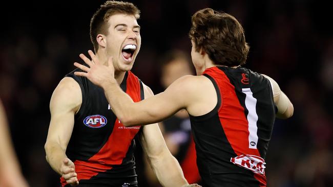 Zach Merrett and Andrew McGrath celebrate during Essendon’s win over Sydney. Picture: Getty Images