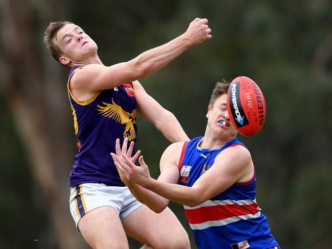 Brook Kainey and Michael King in action during the EFL (Div 1) Sth Croydon v Vermont football match in Sth Croydon, Saturday, June 23, 2018. Picture:Andy Brownbill