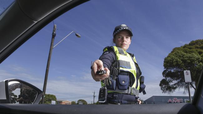 Local police and <i>Leader </i>have joined forces after a spate of thefts from mostly unlocked cars. Constable Lucy Richardson-Smith from Moorabbin police locking a vehicle. Picture: Wayne Taylor