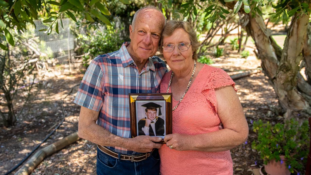 Lawrie and Wendy Brooks hold a photo of their son Jeffrey. Picture: David Martinelli