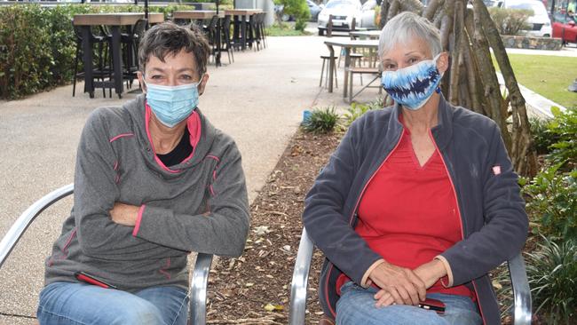 Baked Poetry Cafe customers Carol Nelson of Sunshine Beach and Lin Martin of Peregian are committed to going along with a lockdown.