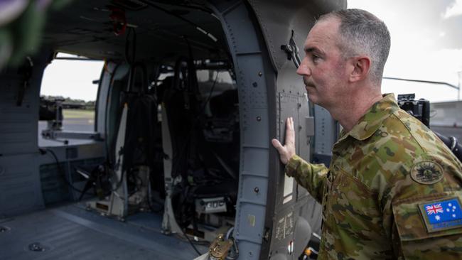 With a new UH-60M Black Hawk helicopter is Colonel Brenton Mellor. Picture: Liam Mendes