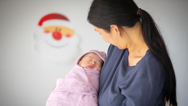 ADELAIDE, SOUTH AUSTRALIA - Advertiser Photos DECEMBER 25, 2024: Serena Huynh with the first Christmas baby Kamila born three minutes past midnight at the WCH, North Adelaide. Picture: Emma Brasier