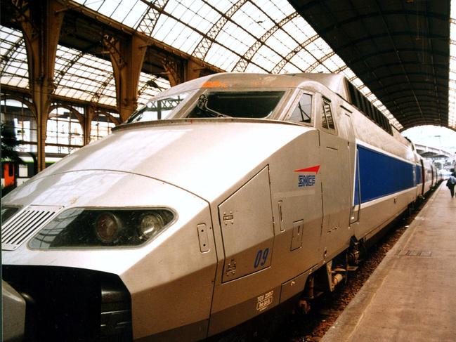 PIRATE: AUGUST 30, 2001 : Sleek bullet nose of Tres Grande Vitesse (TGV) of Very Fast Train at platform of station in Paris in photo reseased 30/08/01.France / RailwayTravel