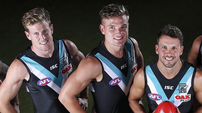 Port Adelaide’s new co-captains Tom Jonas and Ollie Wines with former captain Travis Boak. Picture Sarah Reed