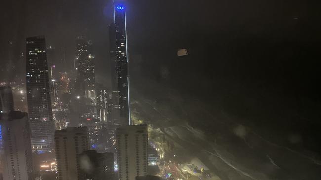 The view from the 65th floor of the Q1 tower in Surfers Paradise where resident Joanie Foster says it is "rocking and rolling" in the Friday night Cyclone Alfred winds.