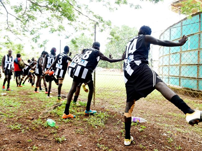 Marrawurri Magpies warm up for the grand final. PICTURE: Elise Derwin