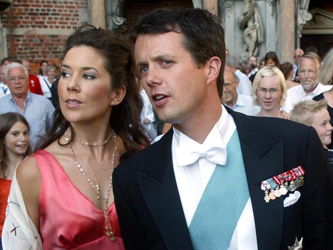 Mary Donaldson hangs off the arm of then-boyfriend Crown Prince Frederik at an event in 2002. Picture: AFP Photo/Scanpix/Keld Navntoft