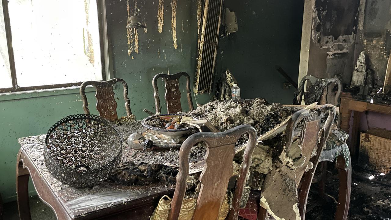 Melted furniture in a room destroyed by fire at a Nambour property.