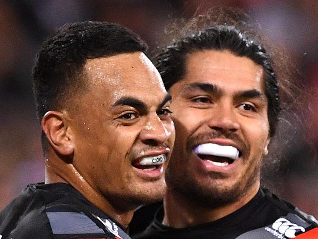 Ken Maumalo of the Warriors (left) reacts with Tohu Harris after scoring a try during the Round 9 NRL match between the New Zealand Warriors and the St George Illawarra Dragons at Suncorp Stadium in Brisbane, Saturday, May 11, 2019.  (AAP Image/Dave Hunt) NO ARCHIVING, EDITORIAL USE ONLY