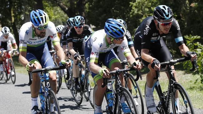 Team Sky and Orica GreenEdge drive the chasing peloton to the Moe. Picture: Michael Klein