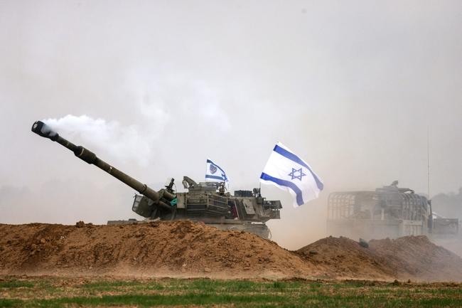 Israel continued to pound Gaza with heavy artillery