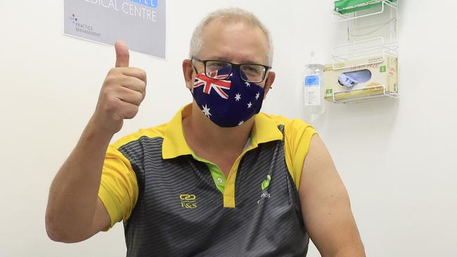 Scott Morrison gives the thumbs up after receiving a Covid-19 vaccination at Castle Hill Medical Centre on Sunday. Picture: Mark Evans/Getty Images