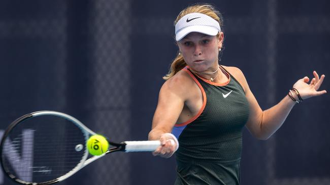 Gold Coast rising tennis star Emerson Jones, 16, winning the Perpetual NSW Open at Sydney Olympic Park. Pictures: Tennis NSW.