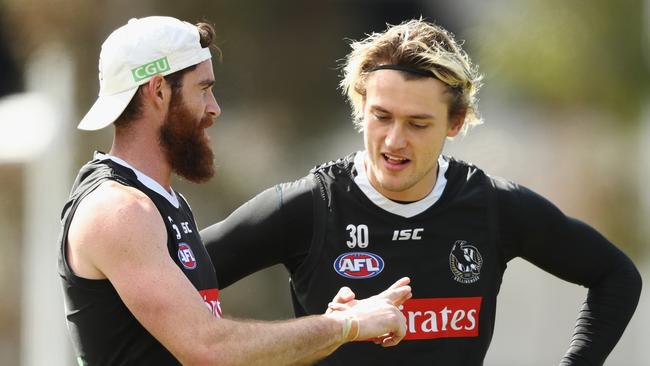 Tyson Goldsack and fellow key defender Darcy Moore. Pic: Getty Images