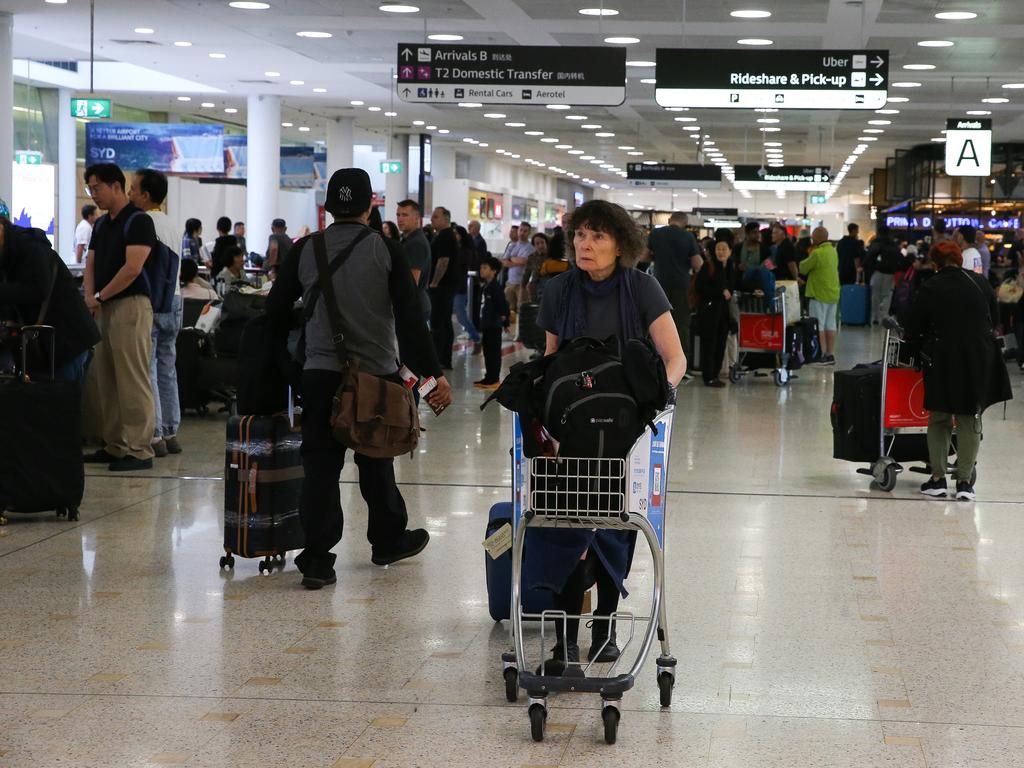 Travellers at Sydney Airport after multiple flights between Australia and Bali were cancelled. Picture: NewsWire/Gaye Gerard