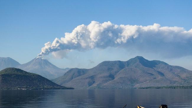 A devastating volcanic eruption on an Indonesian island has led to an Aussie travel risk management company being inundated with hundreds of calls for help.