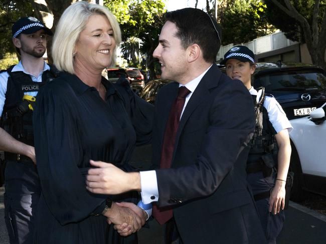 Police Minister Yasmin Catley shakes hands with NSW Jewish Board of Deputies president David Ossip. Picture: Monique Harmer