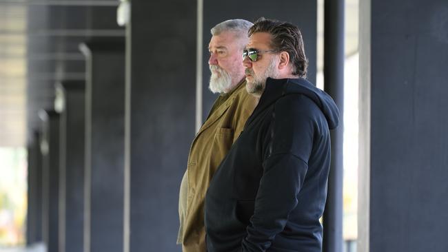 Club co-owner Russell Crowe and GM Shane Richardson watch on at Redfern Oval. Picture: Joel Carrett