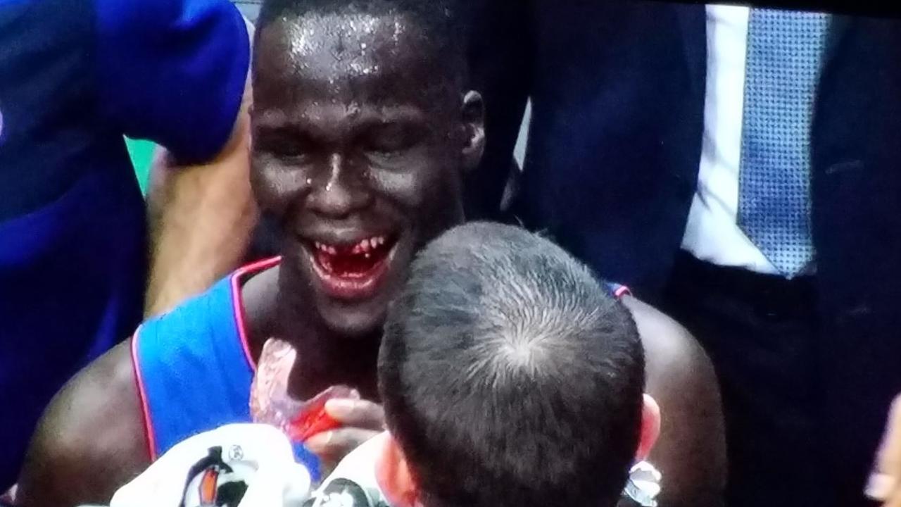 Thon Maker is left bloodied by a huge block.