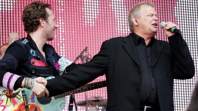 Try and understand it: Chris Martin from Coldplay with John Farnham at Sound Relief