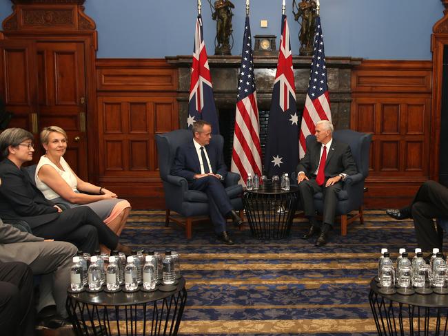 Mike Pence (right) meets with the Opposition Leader Bill Shorten (centre left) on Saturday. Picture: Rick Rycroft-Pool/Getty Images