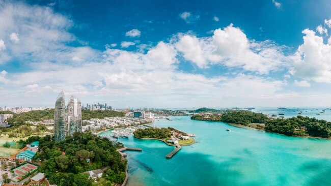 Sentosa island, on the right, is Singapore's adventure playground.