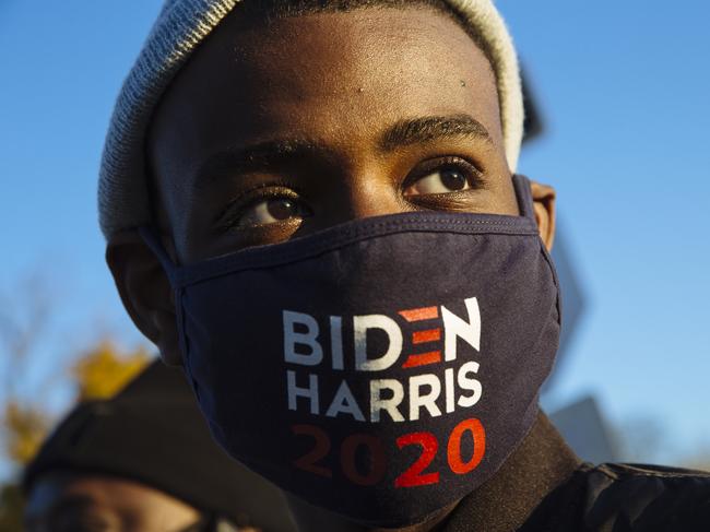 Jerome Barnes, 13, stands amongst other supporters on Belle Isle near where former President Barack Obama was holding a rally with Democratic Presidential Candidate Joe Biden in Detroit, Michigan, USA. Saturday, October 31st, 2020.