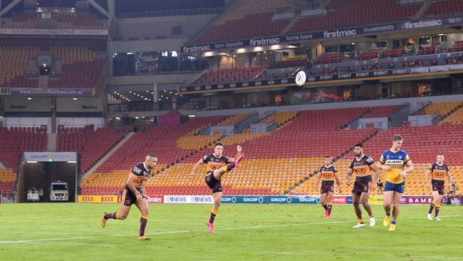 Brodie Croft of the Broncos kicks ahead during the game against the Eels to restart the 2020 NRL season. Picture: Bradley Kanaris/Getty Images