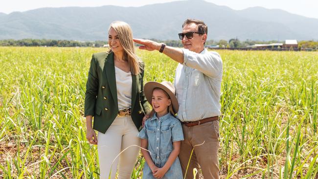 Three generations of the Straguszi family are behind the Cutter's Rise residential development near Gordonvale. Pictured are Cutter's Rise sales agent Renee Straguszi, her daughter Adriana, 7, and her father Ross Straguszi. Picture: Supplied