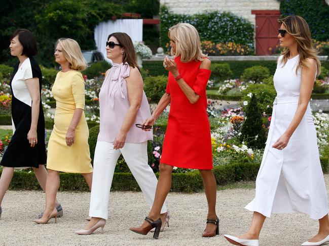 (From back left) Japan's Prime Minister's wife Akie Abe, European Council President's wife Malgorzata Tusk, Australia's Prime Minister's wife Jenny Morrison, wife of French President Brigitte Macron and US First Lady Melania Trump. Picture: AFP